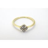 An 18ct gold ring set with four diamonds CONDITION: Please Note - we do not make