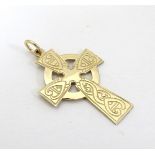 A 9ct gold cross formed pendant 1 ½” long CONDITION: Please Note - we do not make
