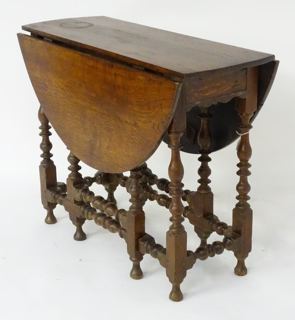 A mid 18thC oak gateleg table opening to form an oval top, - Image 3 of 6