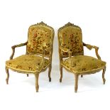 A pair of early 20thC fauteuil armchairs,