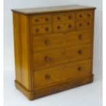 A 19thC walnut chest of drawers with a rectangular top above six short drawers and three long