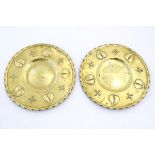 Decorative Metalware: A pair of brass Arts and Crafts chargers with a dished centre,