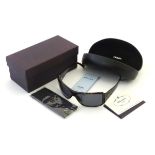 A pair of Prada sunglasses with original case, box, card of authenticity etc.