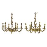 A matched pair of 20thC gilt metal ormolu electroliers / hanging light fittings ,