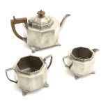 Decorative Metalware: Three items of Arts & Crafts style Sheffield pewter with hammered decoration