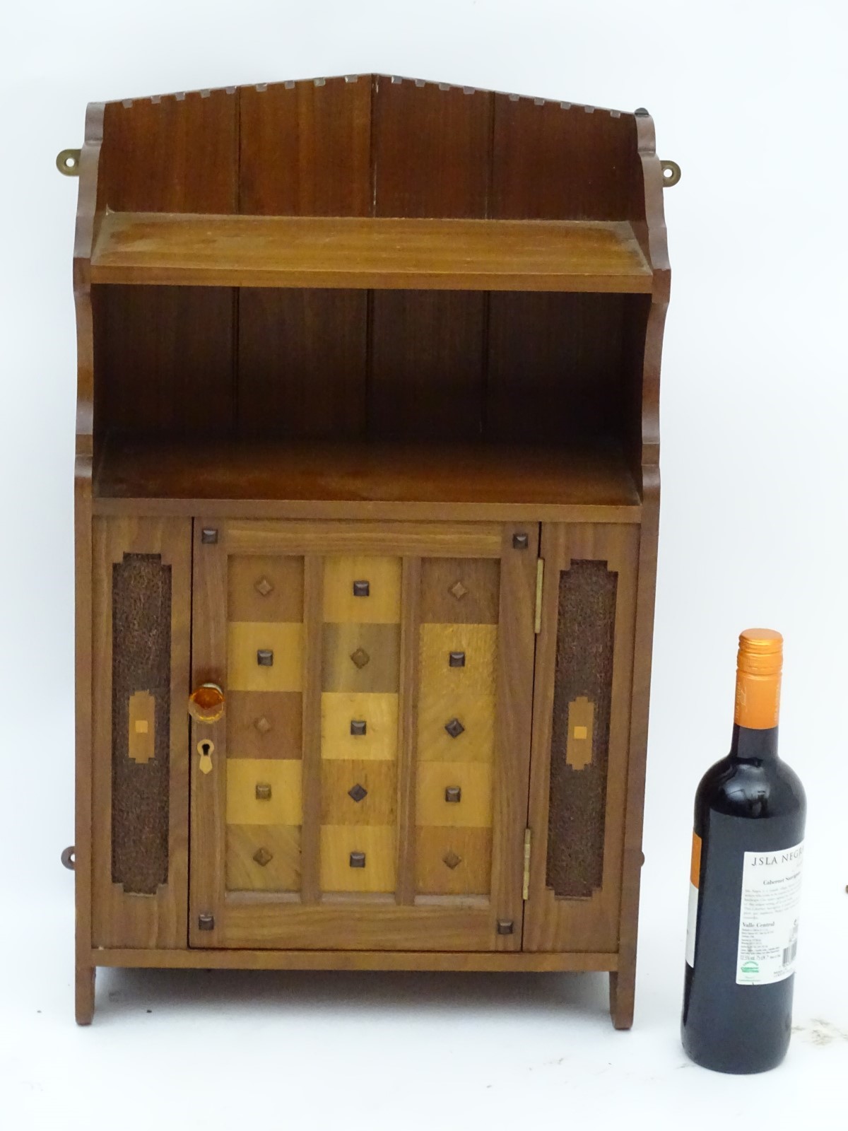 A mid 20thC walnut wall cabinet / table cabinet with a sample wood door and inlaid decoration. - Image 5 of 6