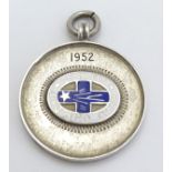 Cycling Interest: A silver fob with enamel decoration for 'Comet Cycling Club ' and engraved ' Club