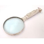 A Novelty magnifying glass with handle formed as a golf bag and clubs 9 1/2" long
