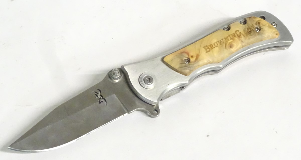 A Browning stainless steel skinning lock knife, with burr maple grips, - Image 8 of 9