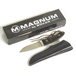 A boxed Magnum by Boker hunting knife, 3 1/2" blade with carbon grips.