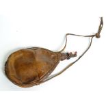 A large French leather flask, stamped 'MF Manufrance St Ettiene, gourde sangou', with ramshorn cap,