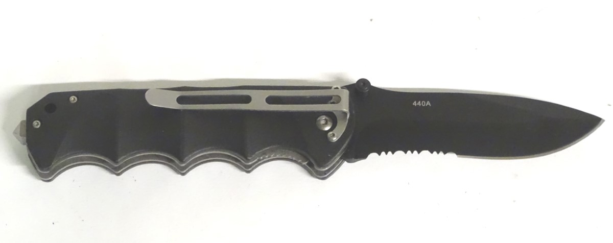 A Magnum by Boker tactical lock knife, with composite grip and 4 1/2" blade with saw. - Image 7 of 8