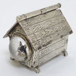 A novelty silver vesta case formed as a dog kennel / dog house with sprung action to roof,