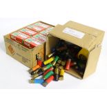 An assortment (approximately 250) of 12 bore clay shooting shotgun cartridges,