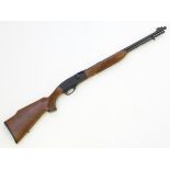 Firearm: a Remington 'Speedmaster Model 552' .
