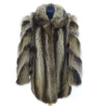 A vintage mid length fur coat, approx.