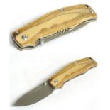 A Magnum by Boker '440B' skinning lock knife,