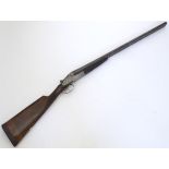 Shotgun: a 19thC 12 bore side by side sidelock ejector shotgun by T. Page Wood Ltd, Bristol.