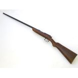 Shotgun: A .410 bolt-action gun by Webley & Scott, Birmingham.