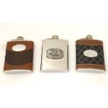 3 various 6oz hip flasks, two with leather covering, the third with pheasant decoration.