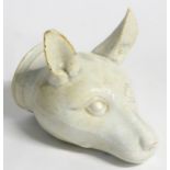 Hunting: A 19thC ceramic stirrup cup formed as the head of a fox. Approx. 4 ½" high x 6" long.