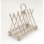 A novelty silver plate toast rack,