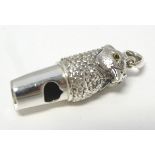 A white metal novelty whistle formed as the head of a pheasant.