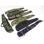 An assortment of gun and rifle slips, in a variety of materials and finishes,