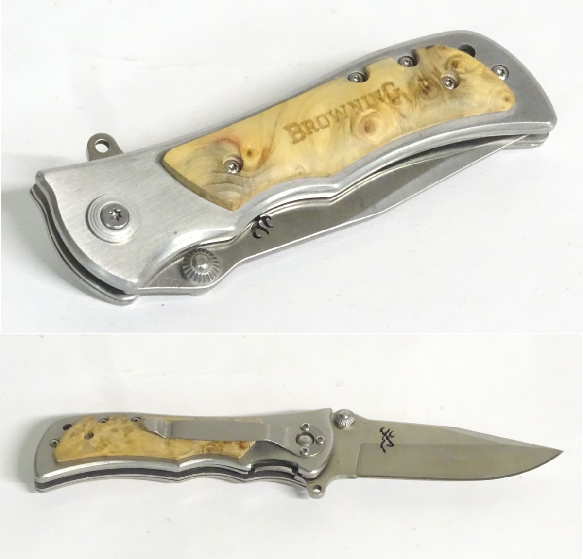 A Browning stainless steel skinning lock knife, with burr maple grips,