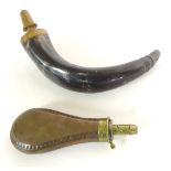 A carved horn and turned walnut powder flask, 10" long,