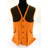 An Amaretta moleskin orange gilet,