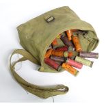 A 1944 US/British Army webbing bag containing a quantity of vintage and collectable paper cased