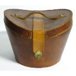 A mid 20thC '' Brooks Brothers '' brown leather saddle shaped hat box with red silk lining ,