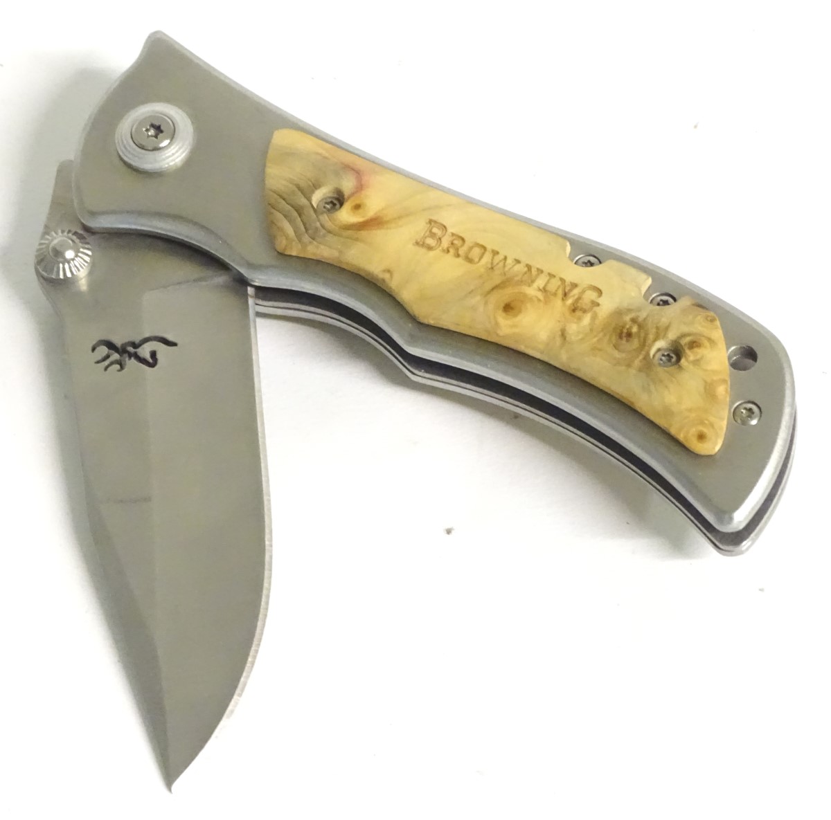 A Browning stainless steel skinning lock knife, with burr maple grips, - Image 7 of 9