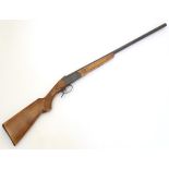 Shotgun: a Baikal 'Ij 18' 12 bore underlever-cocking single barrel shotgun,