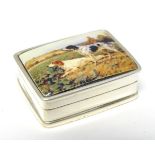 A white metal pill box with enamel decoration to lid depicting gun dogs.