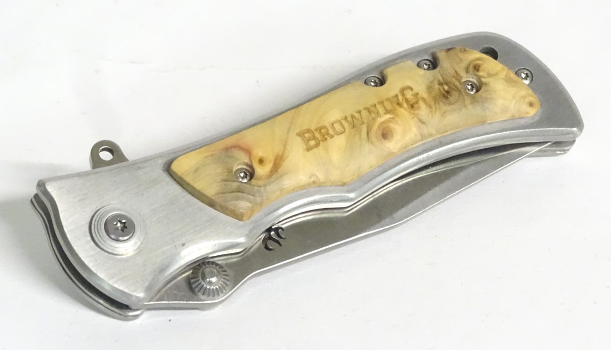 A Browning stainless steel skinning lock knife, with burr maple grips, - Image 9 of 9