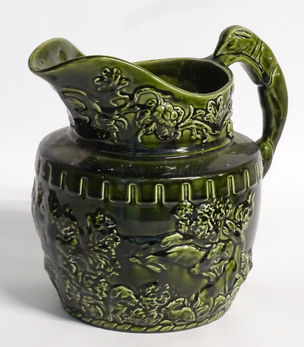 A 20thC Arthur Wood jug / pitcher, decorated with moulded hunting scenes and scrolling foliage, - Image 3 of 8