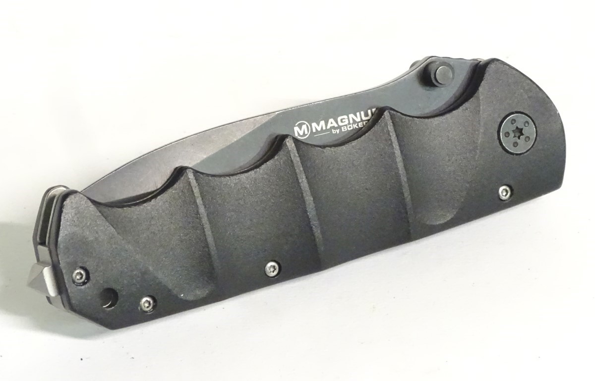 A Magnum by Boker tactical lock knife, with composite grip and 4 1/2" blade with saw. - Image 8 of 8