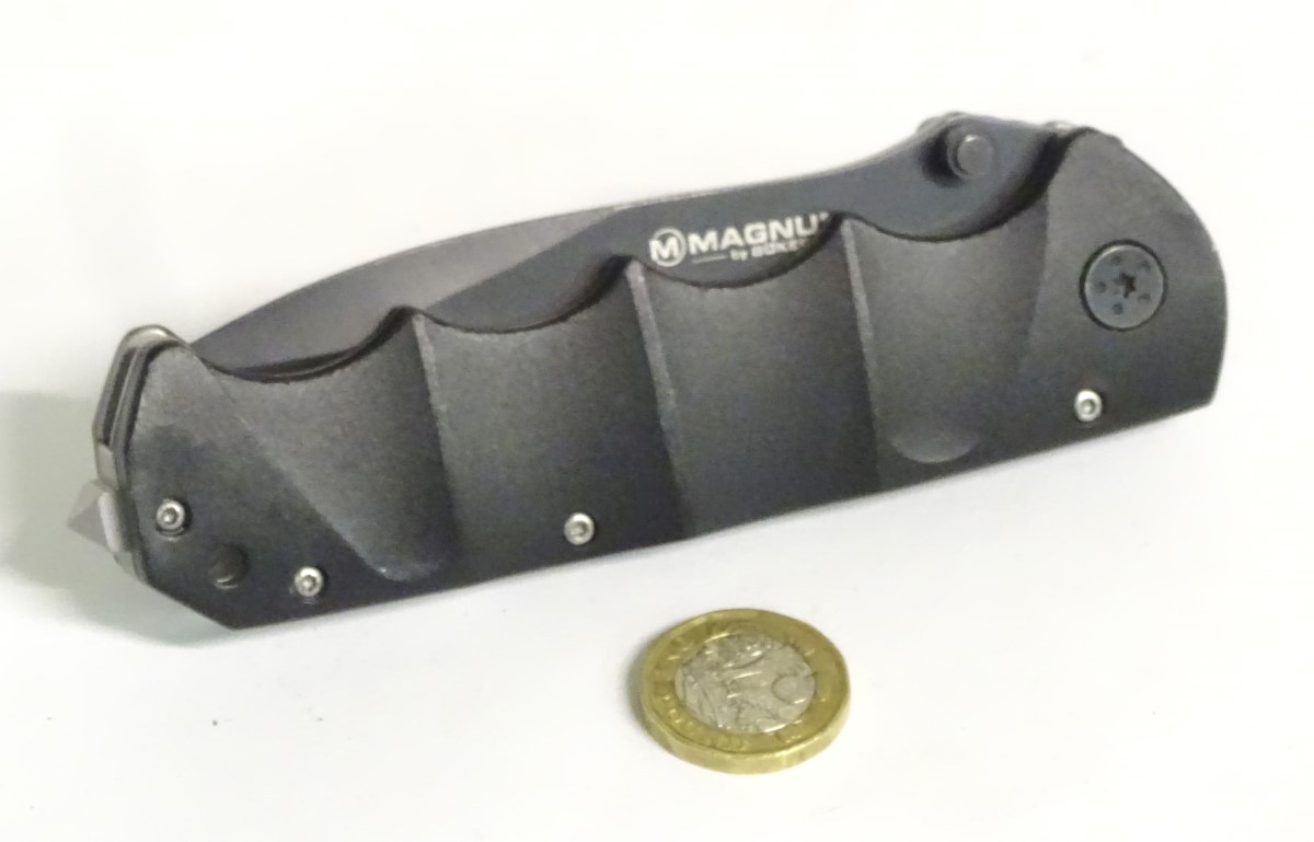 A Magnum by Boker tactical lock knife, with composite grip and 4 1/2" blade with saw. - Image 5 of 8