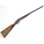 Shotgun: a Merkel 16 bore side by side boxlock non-ejector,