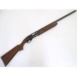 Shotgun: a Remington 'Model 1100' 12 bore semi-automatic sporting gun.