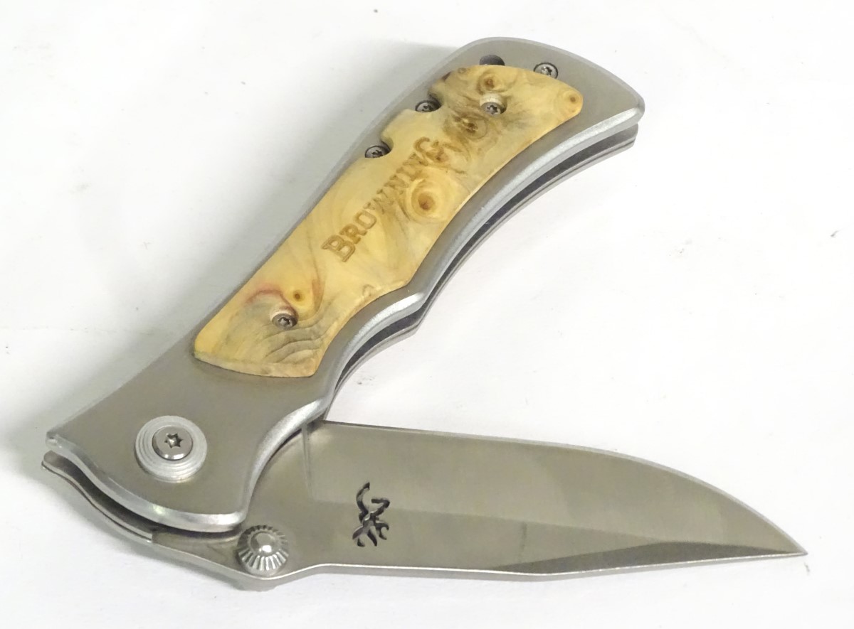 A Browning stainless steel skinning lock knife, with burr maple grips, - Image 6 of 9