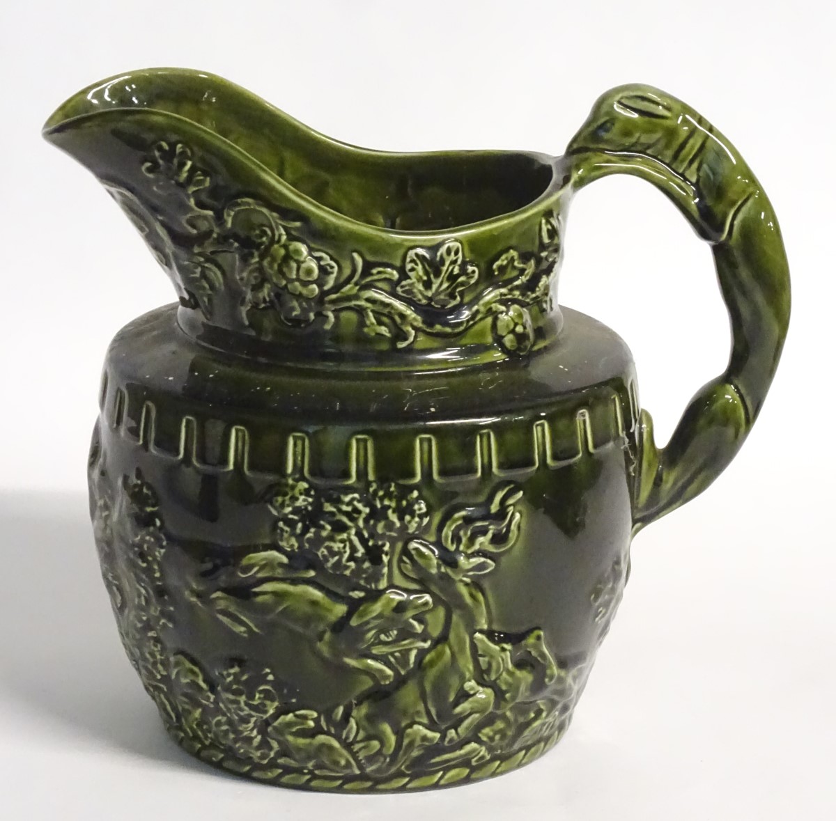 A 20thC Arthur Wood jug / pitcher, decorated with moulded hunting scenes and scrolling foliage, - Image 5 of 8