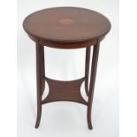 A small circular inlaid table CONDITION: Please Note - we do not make reference to