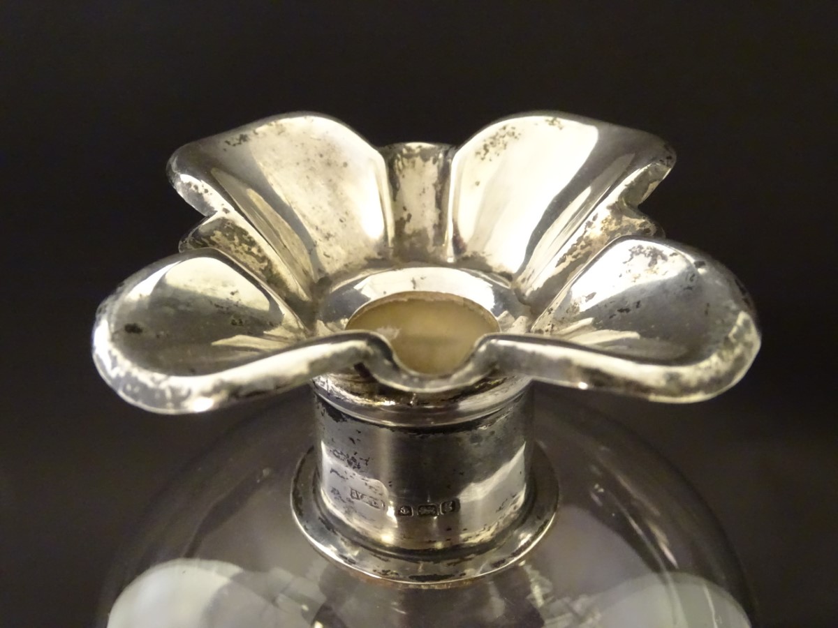 A glass decanter with pinch waist detail and silver rim hallmarked Birmingham 1906. 11" high - Image 5 of 8