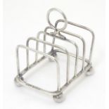 A small silver 5 bar toast rack hallmarked Sheffield 1926 maker Atkin Brothers.