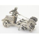A Continental silver model of a Roman figure in chariot with horses.