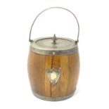 A ceramic lined lidded biscuit barrel with wooden exterior and silver plate mounts and swing handle.