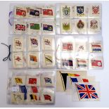 A large quantity of B.D.V. and Kensitas silk etc. cigarette cards depicting flags.